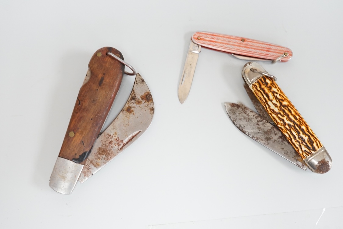 A collection of assorted penknives and whistles